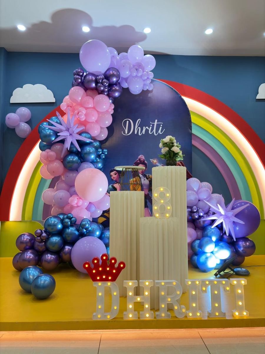 Purple chrome balloon birthday setup